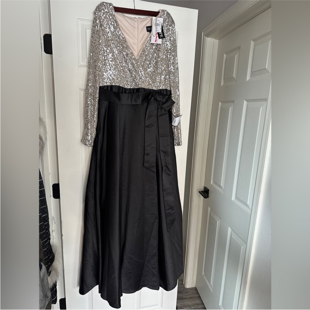 Xscape Silver Sequin Bodice Black Satin Skirt Long Sleeve Gown